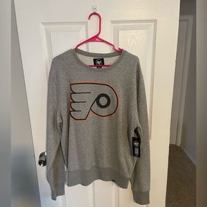 BRAND NEW with tag. Flyers crewneck. Size L.